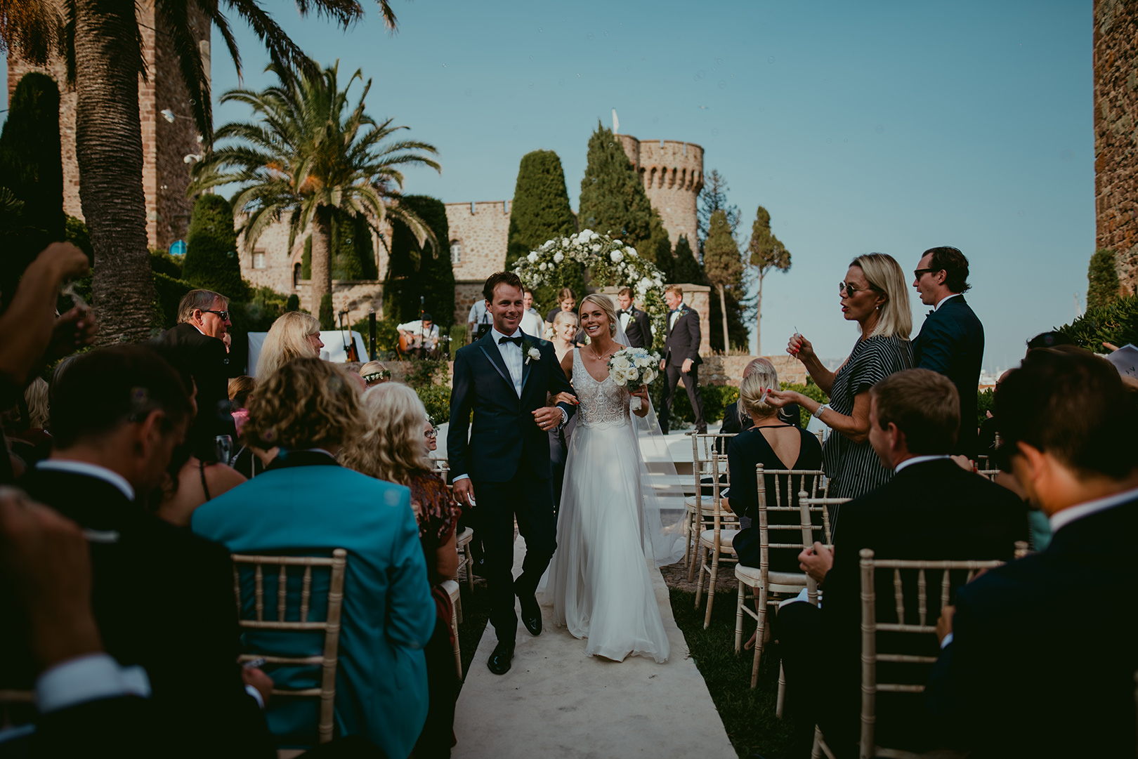 Walking down the ailse at wedding in Cannes France